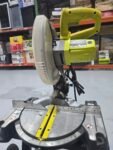 RYOBI  Sierra ingletadora compuesta deslizante de 15 amperios y 10 pulgadas TSS121 (renovada)